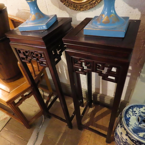 735 - Pair of Antique Carved Hardwood Stands Restrained Geometric Design Each Approximately 42 Inches High