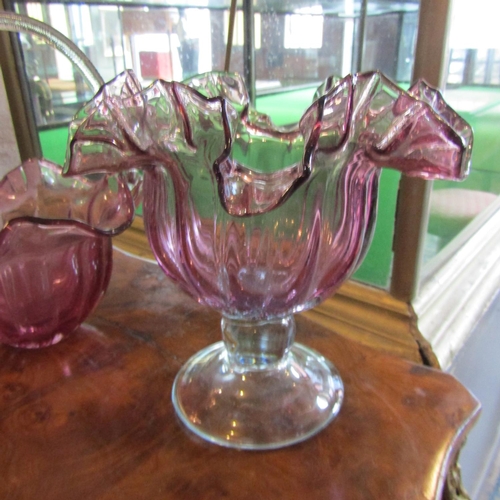 74 - Two Ruby Glass Vases One Pedestal Form Largest Approximately 9 Inches High