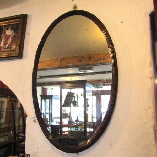 79 - Antique Mahogany Oval Form Upright Wall Mirror Approximately 32 Inches High