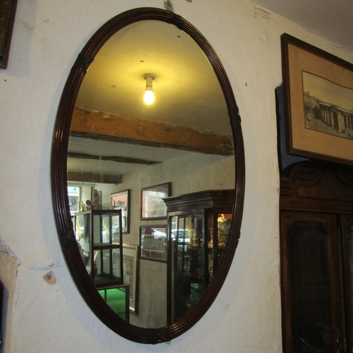 79 - Antique Mahogany Oval Form Upright Wall Mirror Approximately 32 Inches High