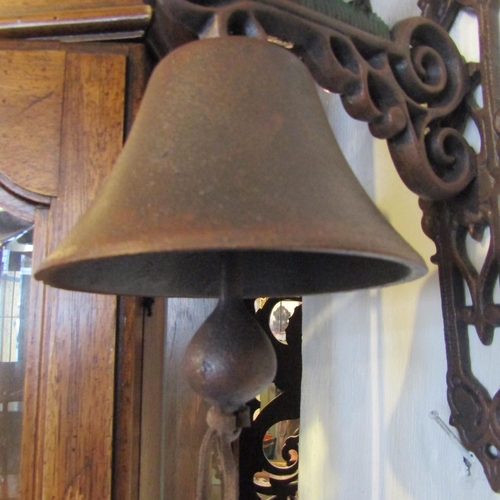 81 - Painted Iron Wall Mounted Bell with Canin Motif