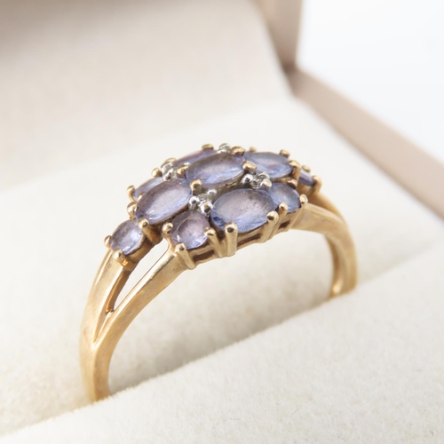 Tanzanite and Diamond Cluster Ring Mounted on 9 Carat Yellow Gold Band Ring Size T