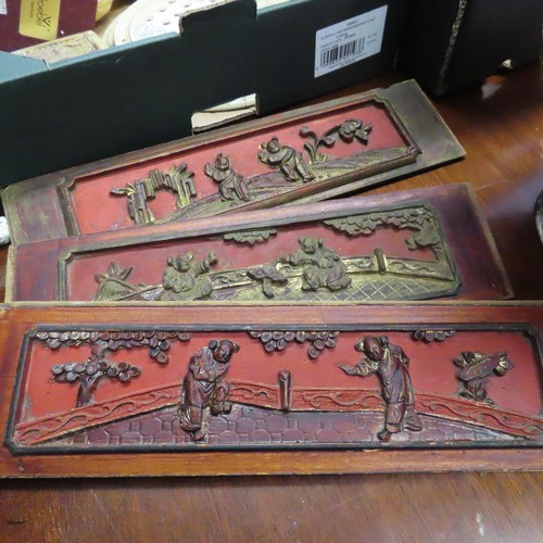 100L - Three Oriental Carved Wooden and Gilded Inset Panels Red Ground Each Approximately 14 Inches Wide