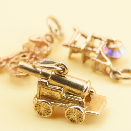 100 - Three 9 Carat Yellow Gold Charms 4.4 Grams