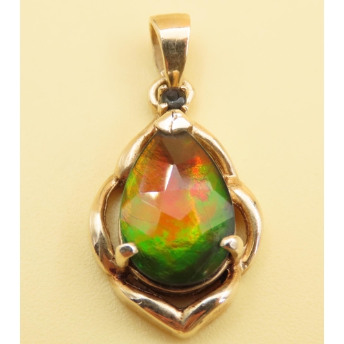 107 - Pear Cut Ammolite Pendant 2cm Drop Set in 14 Carat Yellow Gold