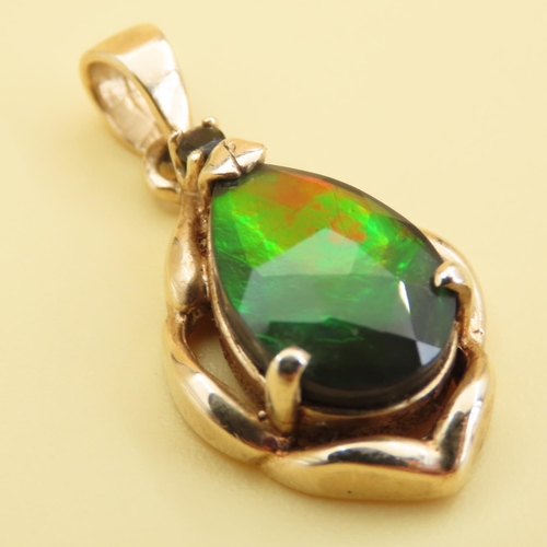 107 - Pear Cut Ammolite Pendant 2cm Drop Set in 14 Carat Yellow Gold