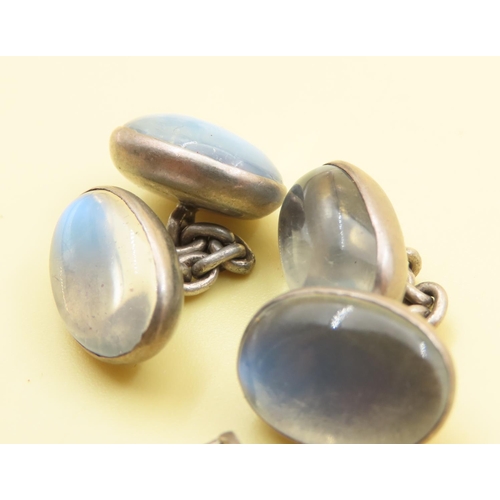 113 - Two Pairs of Silver Cuff Link Hunting Boot Motifs and Cabochon Polished Oval Inset Moonstone