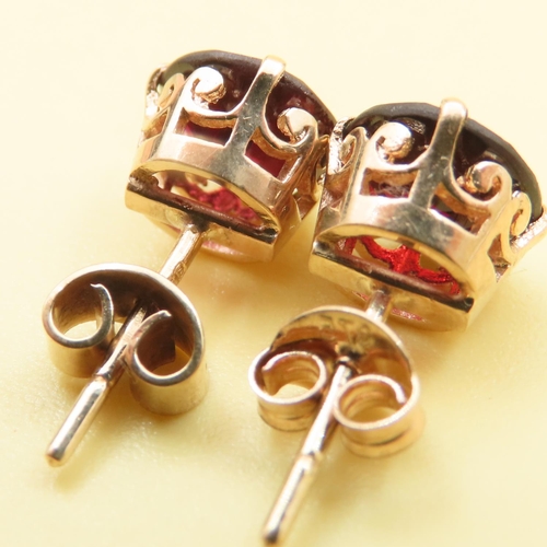 118 - Pair of Red Garnet Basket Set Stud Earrings Mounted on 9 Carat Yellow Gold Each 1cm High