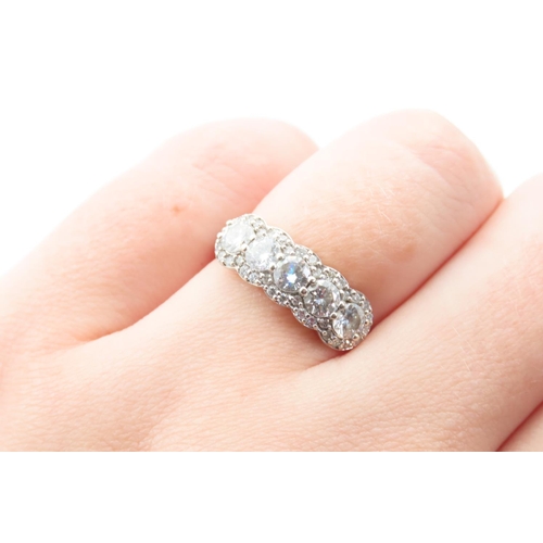 124 - Five Stone Diamond Ring with Further Diamond Inset to 18 Carat White Gold Band Ring Size M