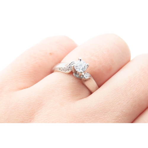 125 - 18 Carat White Gold Diamond Solitaire Ring with Further Diamonds to Shoulders Ring Size N