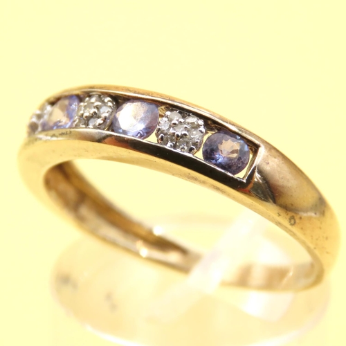134 - Tanzanite and Diamond Channel Set Half Eternity Ring Mounted on 9 Carat Yellow Gold Band Size S