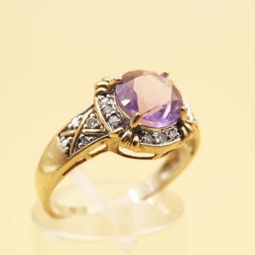 136 - Amethyst and Diamond Cluster Ring Mounted on 9 Carat Yellow Gold Band Size O