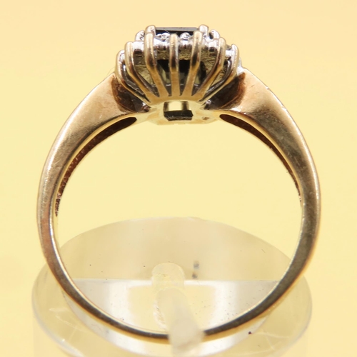 140 - Emerald Cut Sapphire and Diamond Cluster Ring Mounted on 9 Carat Yellow Gold Band Size M
