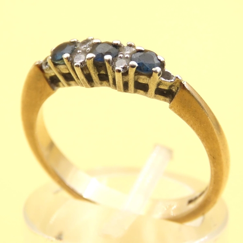 155 - Three Stone Sapphire and Diamond Ring Mounted on 9 Carat Yellow Gold Band Size N