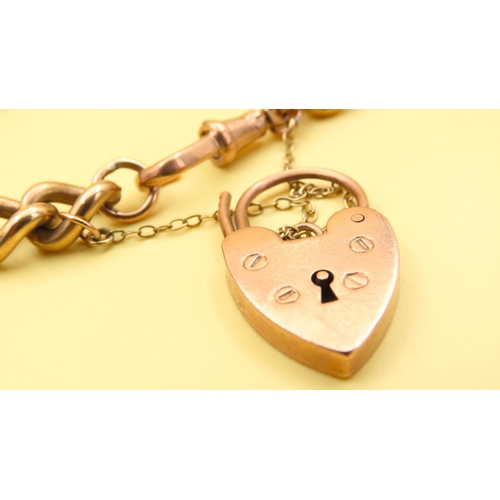 170 - 9 Carat Rose Gold Curb Link Heart Locket Bracelet 19cm Long 44.6 Grams