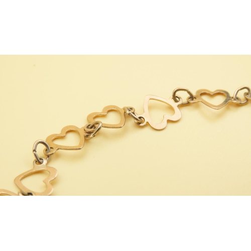 182 - 9 Carat Yellow Gold Linked Hearts Bracelet 18cm Long