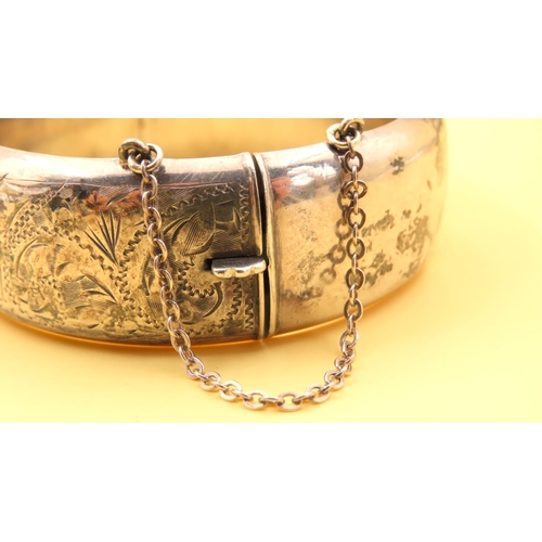 195 - Two Silver Ladies Wrist Bangles Hinge Form Incised Detailing to Both Inner Width 7cm Each