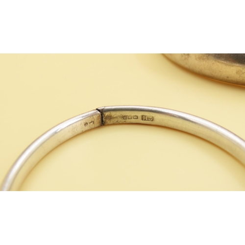 200 - Two Silver Bangles Hinge Form 7cm and 6.5cm Inner Diameter