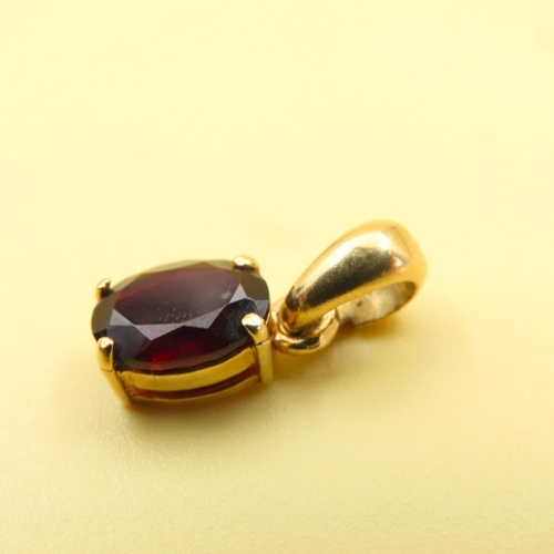 205 - Red Garnet Pendant Set in 18 Carat Yellow Gold 2cm High