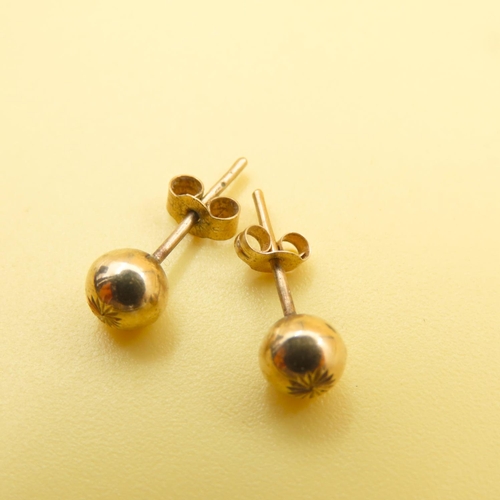 211 - Pair of 9 Carat Yellow Gold Stud Earrings