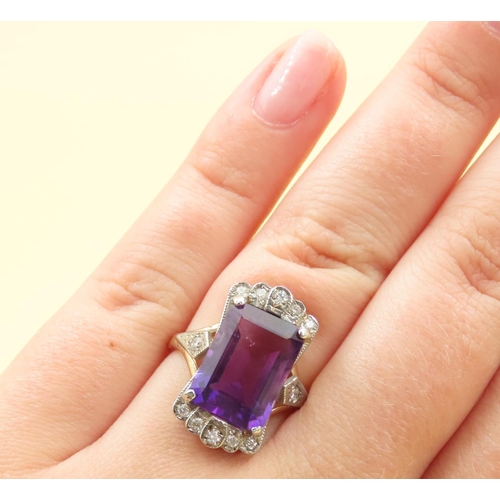 218 - Amethyst and Diamond Ladies Ring Mounted on 9 Carat Yellow Gold Band Ring Size O