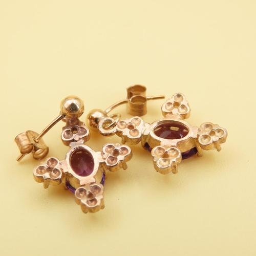 219 - Pair of Amethyst and Pearl Set Ladies Earrings Mounted in 9 Carat Yellow Gold Each 1.5cm High