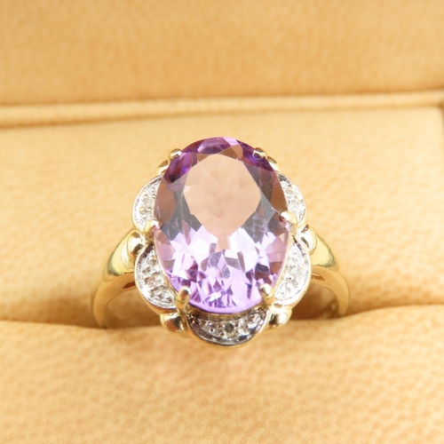 220 - Amethyst Oval Cut Centerstone Ring 9 Carat Yellow Gold Band Ring Size U