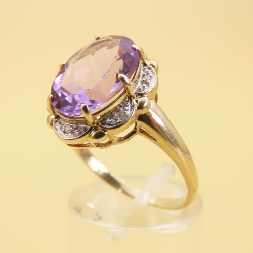 220 - Amethyst Oval Cut Centerstone Ring 9 Carat Yellow Gold Band Ring Size U