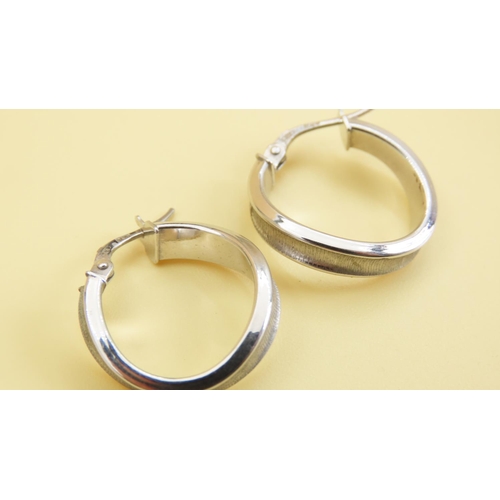 223 - Pair of 9 Carat White Gold Ladies Earrings Shaped Form Each 2cm Diameter