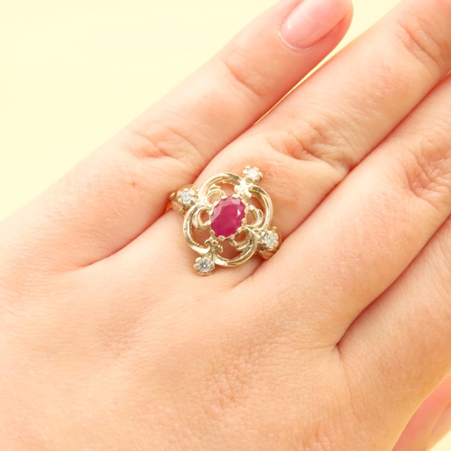 224 - Ruby and Diamond Set Ladies Ring Mounted on 9 Carat Yellow Gold Band Attractively Detailed Ring Size... 