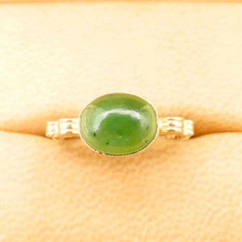 227 - Jade Cabochon Polished Oval Cut Centre Stone Ring Mounted on 9 Carat Yellow Gold Band Ring