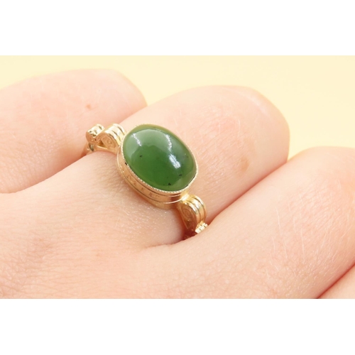 227 - Jade Cabochon Polished Oval Cut Centre Stone Ring Mounted on 9 Carat Yellow Gold Band Ring