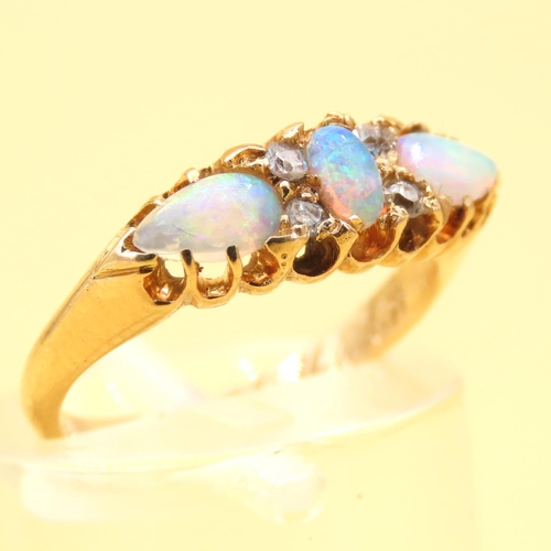 23 - Three Stone Opal and Diamond Ring Mounted on 18 Carat Yellow Gold Band Size I and a Half