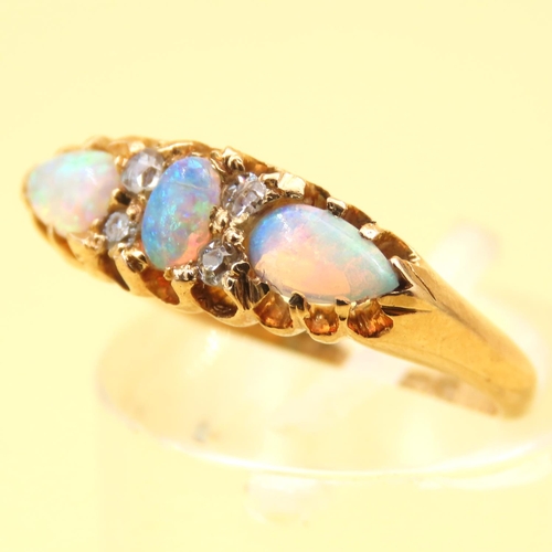 23 - Three Stone Opal and Diamond Ring Mounted on 18 Carat Yellow Gold Band Size I and a Half