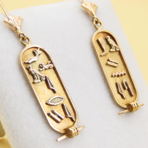 233 - Pair of 18 Carat Yellow Gold Hieroglyphic Drop Form Earrings Attractively Detailed Each 5cm High