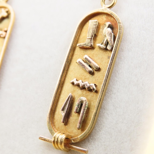 233 - Pair of 18 Carat Yellow Gold Hieroglyphic Drop Form Earrings Attractively Detailed Each 5cm High