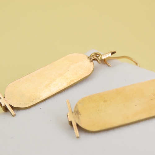 233 - Pair of 18 Carat Yellow Gold Hieroglyphic Drop Form Earrings Attractively Detailed Each 5cm High