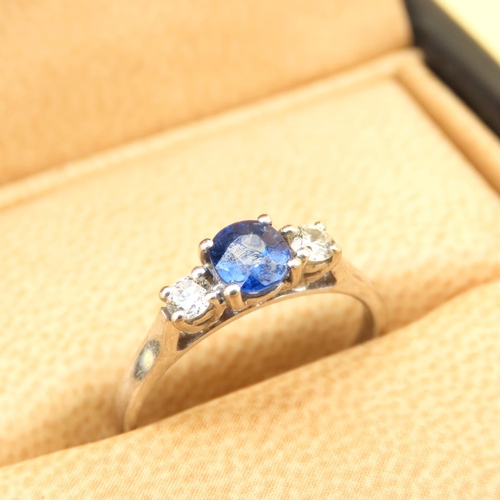 24 - Sapphire and Diamond Three Stone Ring Set on 18 Carat White Gold Band Size L