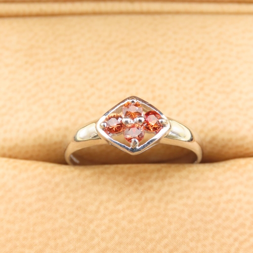 253 - Four Stone Orange Sapphire Set Ring Mounted on 9 Carat White Gold Band Size N