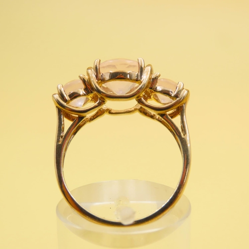 255 - Three Stone Rose Quartz Ring Mounted on 9 Carat Yellow Gold Band Size N