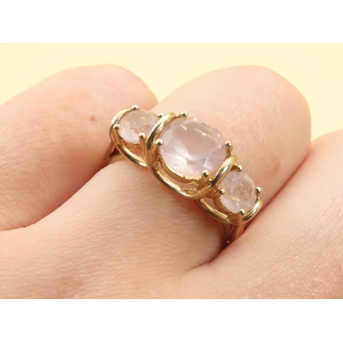 255 - Three Stone Rose Quartz Ring Mounted on 9 Carat Yellow Gold Band Size N