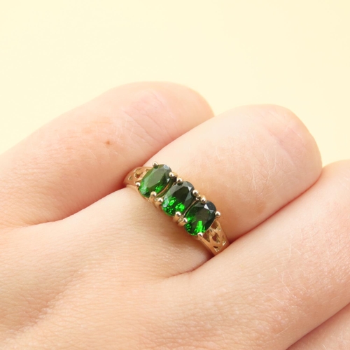 261 - Russian Diopside Three Stone Ring Mounted on 9 Carat Yellow Gold Band Size N