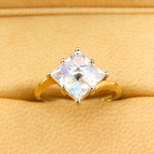 265 - Sri Lankan Rainbow Moonstone Set Four Stone Ring Mounted on a 9 Carat Yellow Gold Band Size N