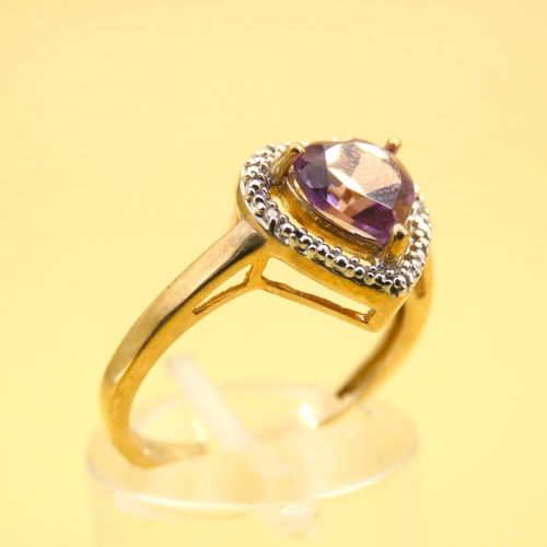 266 - Amethyst Heart Motif Ring with Diamond Halo Setting Mounted on 9 Carat Yellow Gold Band Size N