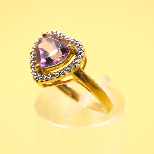 266 - Amethyst Heart Motif Ring with Diamond Halo Setting Mounted on 9 Carat Yellow Gold Band Size N