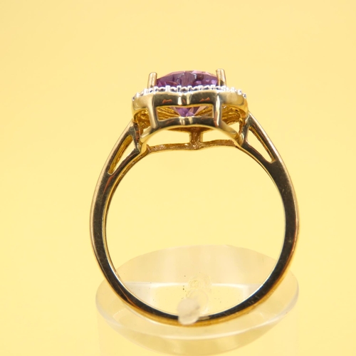 266 - Amethyst Heart Motif Ring with Diamond Halo Setting Mounted on 9 Carat Yellow Gold Band Size N