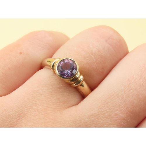 269 - Bezel Set Amethyst Solitaire Ring Mounted on 9 Carat Yellow Gold Band Size N