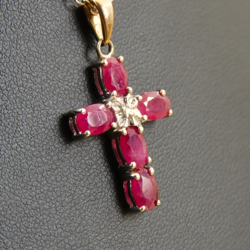 271 - Five Stone Ruby and Diamond Set Crucifix Form Pendant Mounted in 9 Carat White Gold Further Set in 1... 