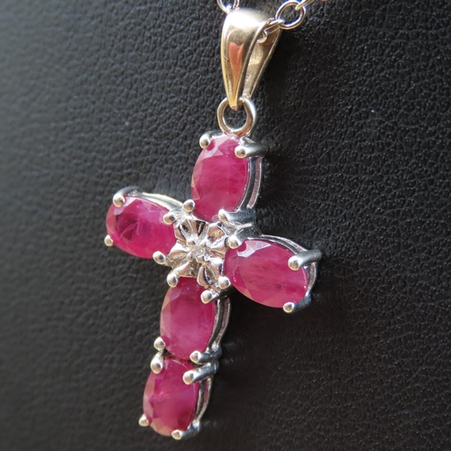 271 - Five Stone Ruby and Diamond Set Crucifix Form Pendant Mounted in 9 Carat White Gold Further Set in 1... 