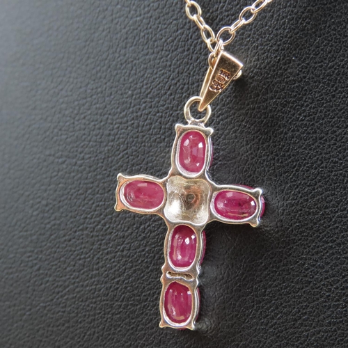 271 - Five Stone Ruby and Diamond Set Crucifix Form Pendant Mounted in 9 Carat White Gold Further Set in 1... 